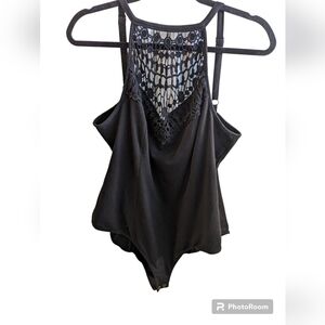 Torrid plus size body suit, black size 1.  Lace in front of bodice .  Snaps